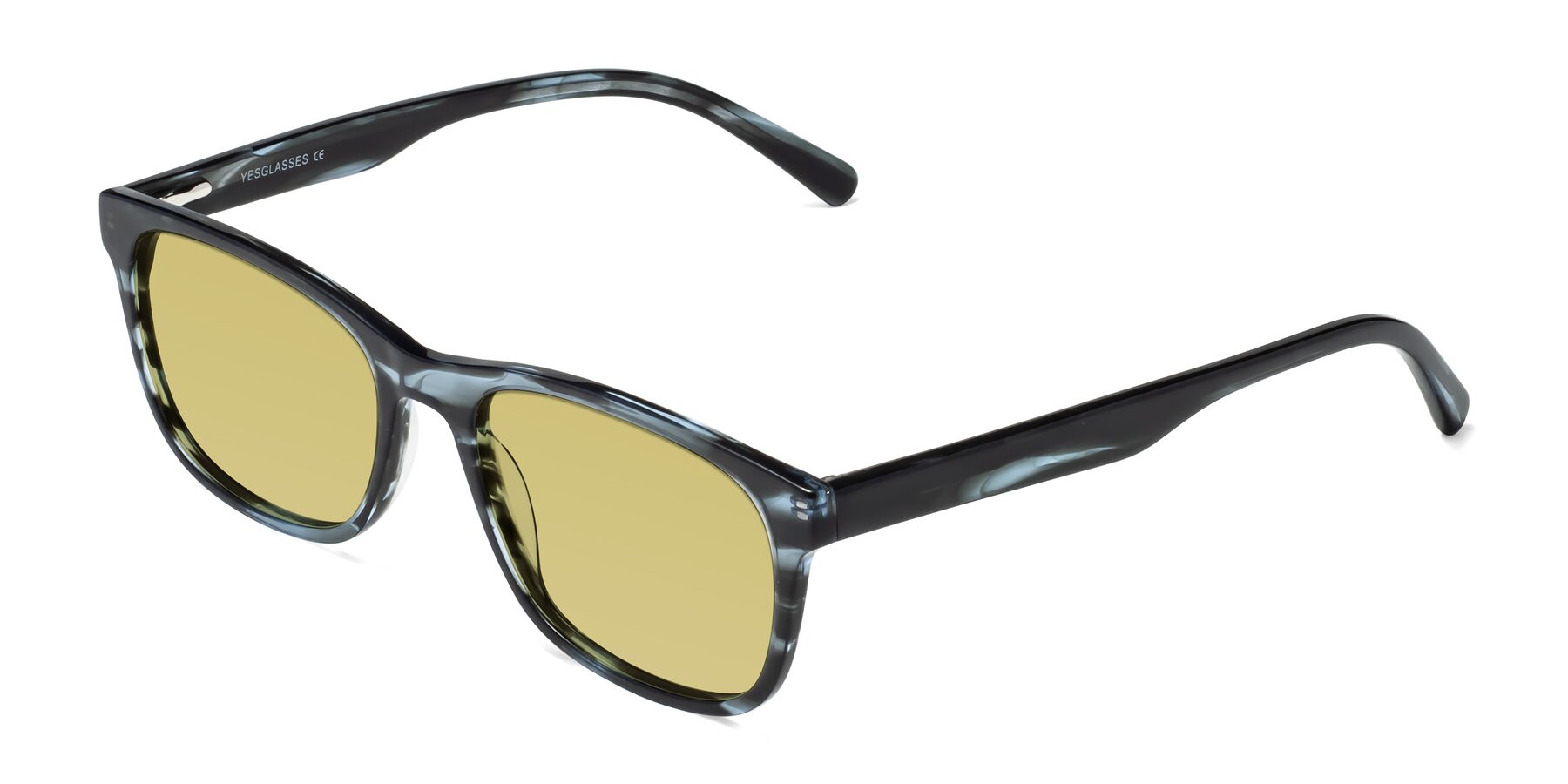 Angle of Navarro in Blue-Tortoise with Medium Champagne Tinted Lenses