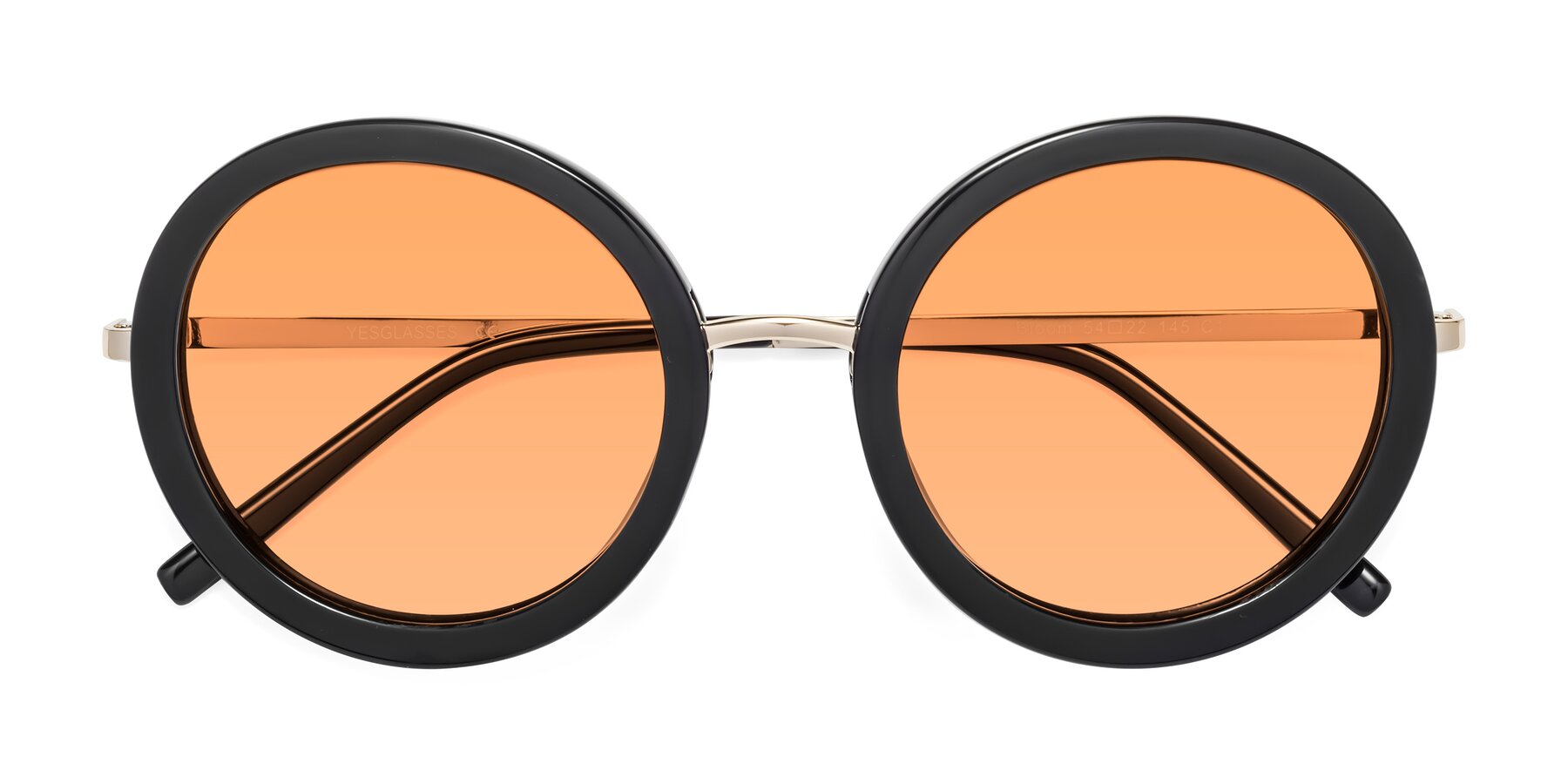 Folded Front of Bloom in Black with Medium Orange Tinted Lenses