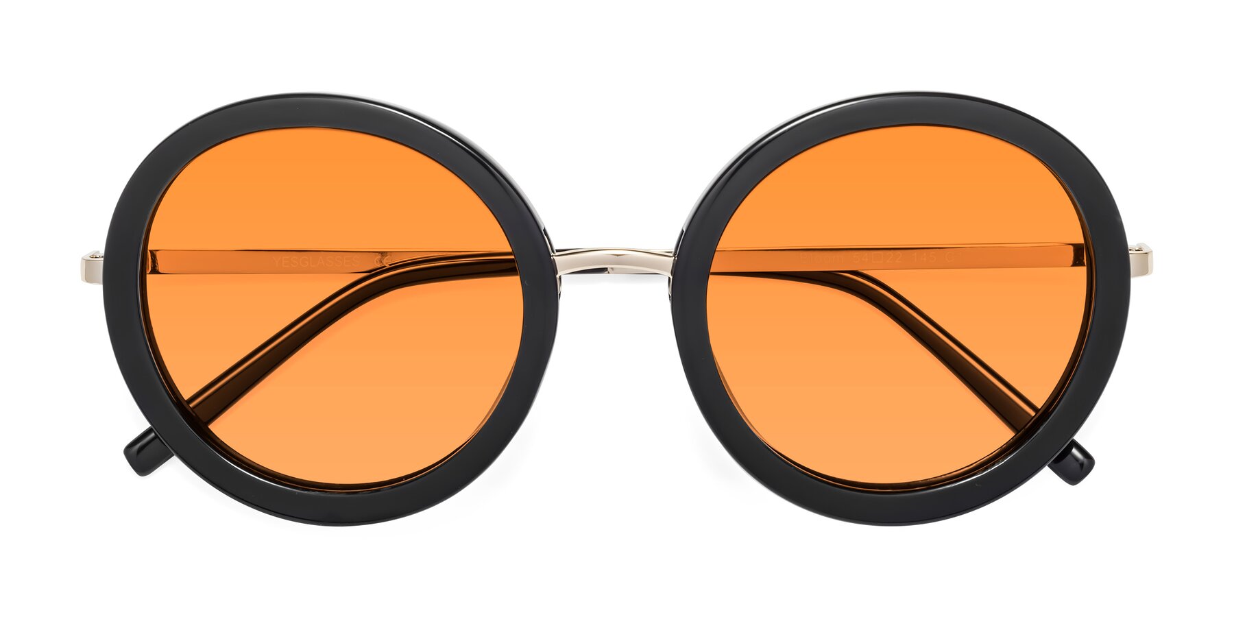Folded Front of Bloom in Black with Orange Tinted Lenses