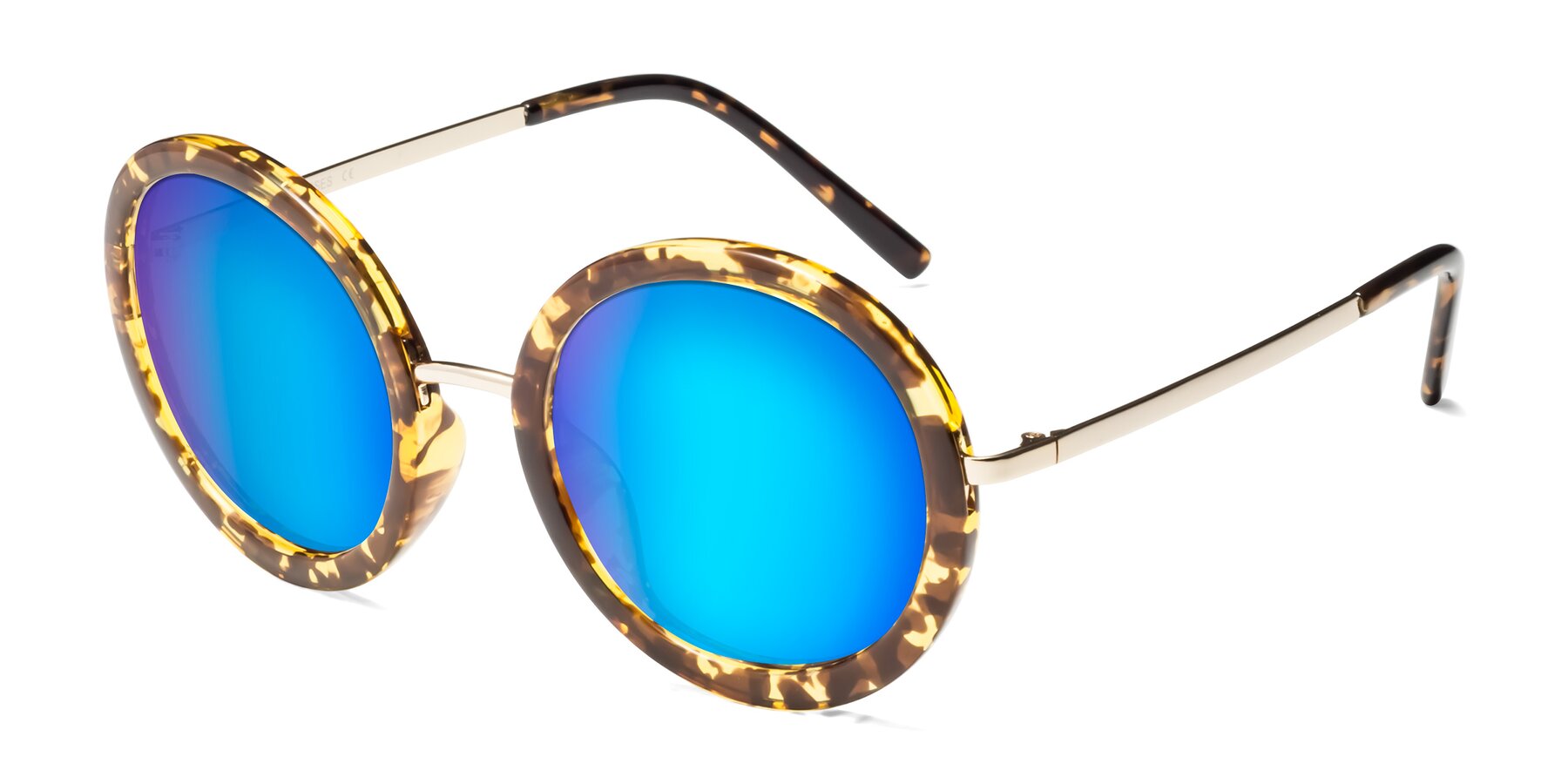 Angle of Bloom in Transparent Tortoise with Blue Mirrored Lenses