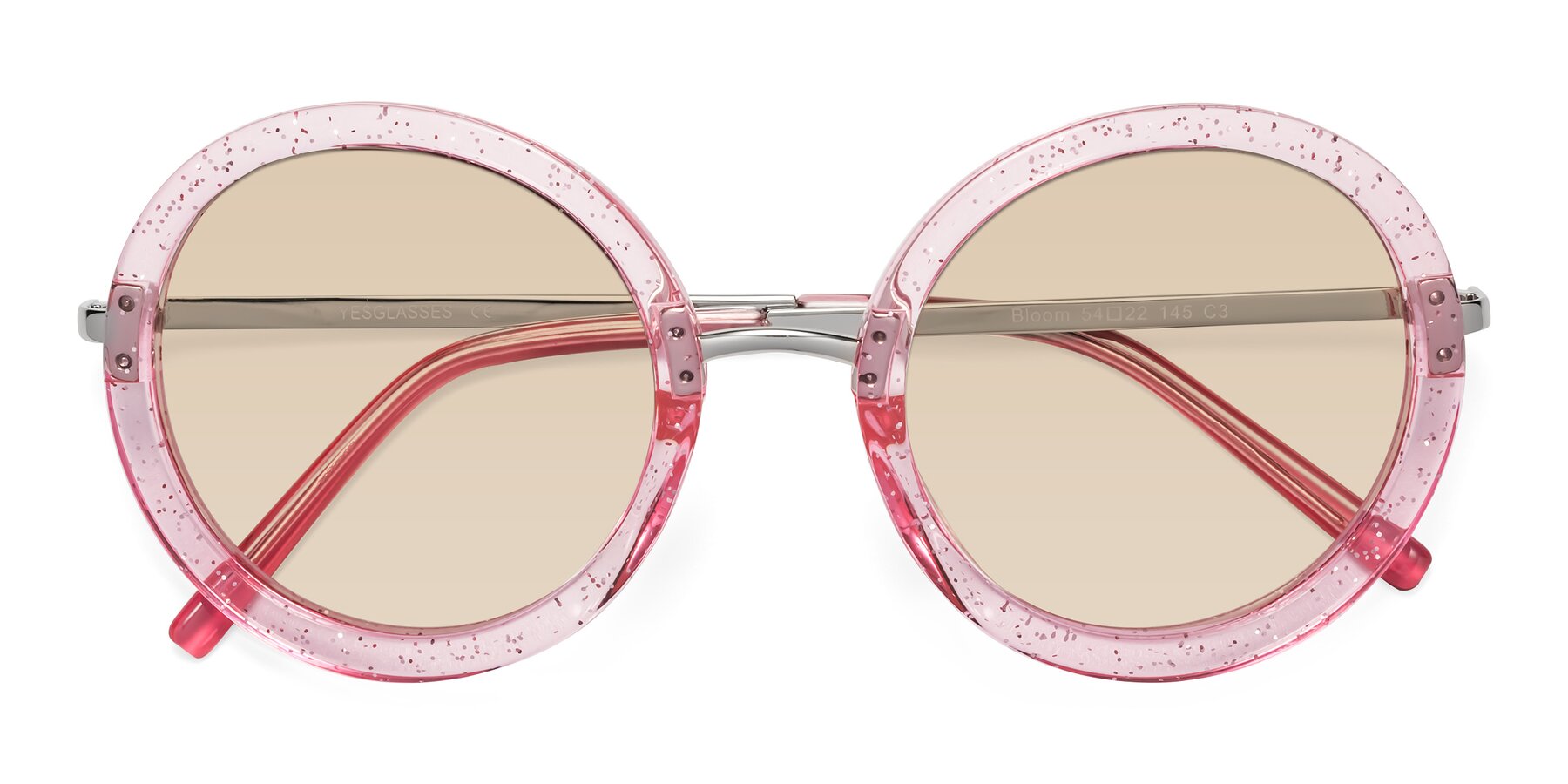 Folded Front of Bloom in Transparent Pearl Pink with Light Brown Tinted Lenses
