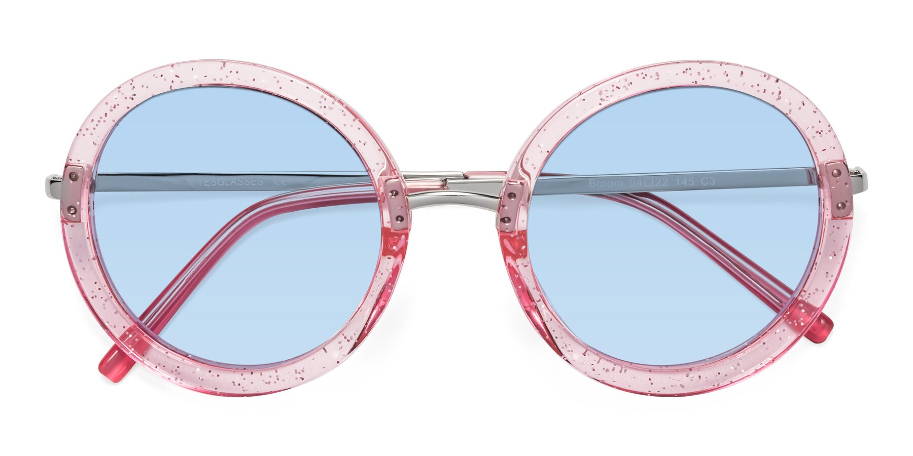 Folded Front of Bloom in Transparent Pearl Pink with Light Blue Tinted Lenses