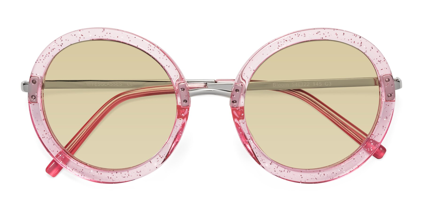 Folded Front of Bloom in Transparent Pearl Pink with Light Champagne Tinted Lenses