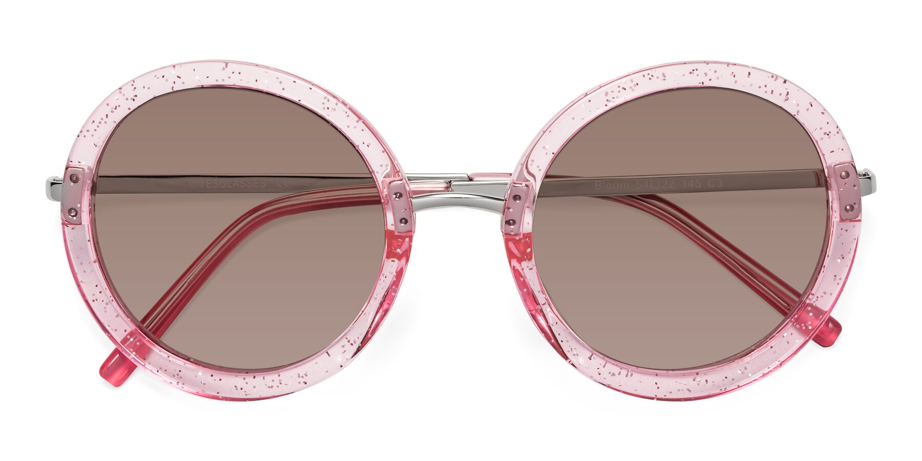 Folded Front of Bloom in Transparent Pearl Pink with Medium Brown Tinted Lenses