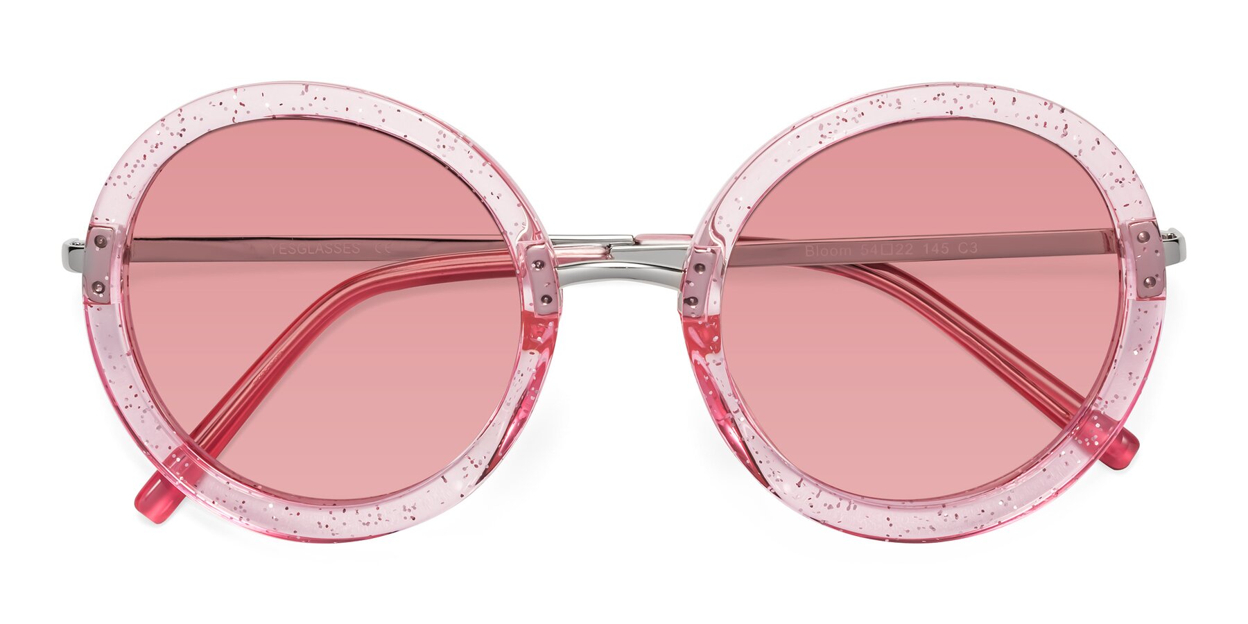 Folded Front of Bloom in Transparent Pearl Pink with Medium Garnet Tinted Lenses