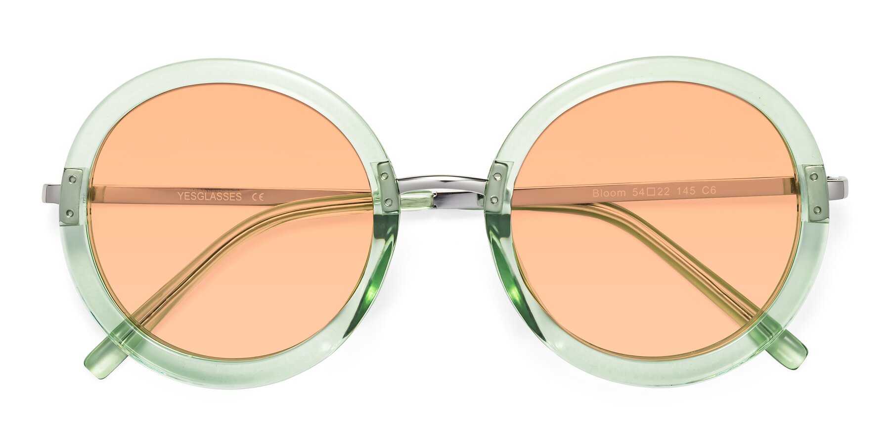Folded Front of Bloom in Mint Green with Light Orange Tinted Lenses