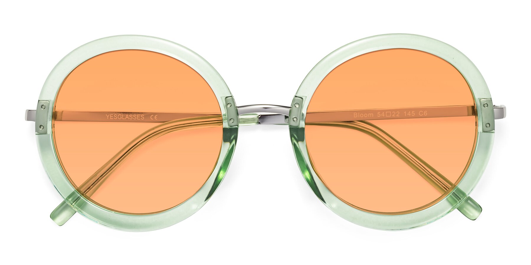 Folded Front of Bloom in Mint Green with Medium Orange Tinted Lenses