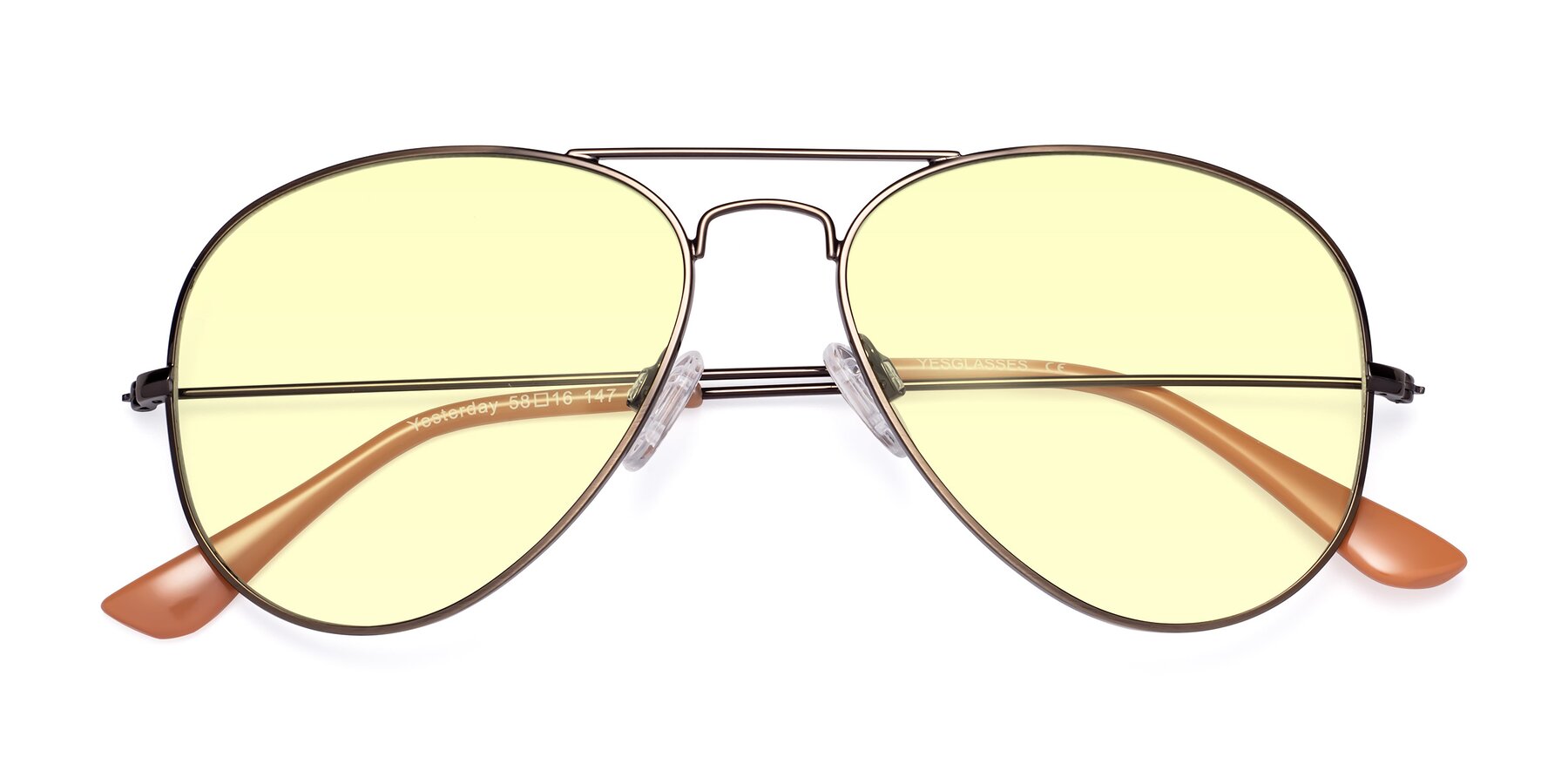 Folded Front of Yesterday in Antique Bronze with Light Yellow Tinted Lenses