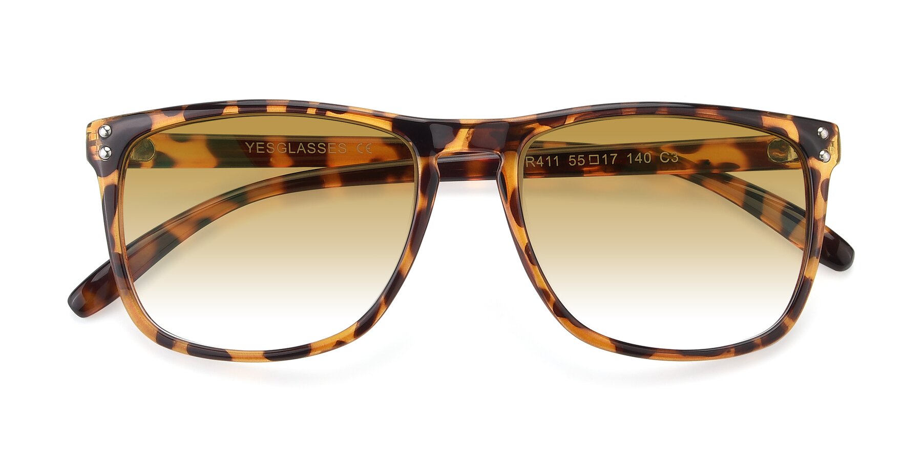 Folded Front of SSR411 in Translucent Orange Tortoise with Champagne Gradient Lenses