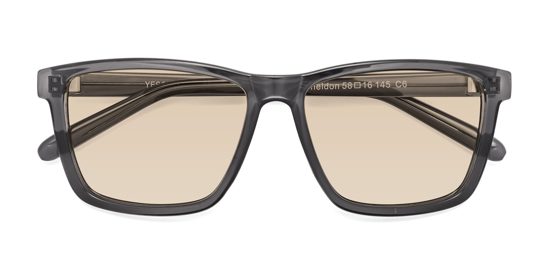 Folded Front of Sheldon in Transparent Gray with Light Brown Tinted Lenses