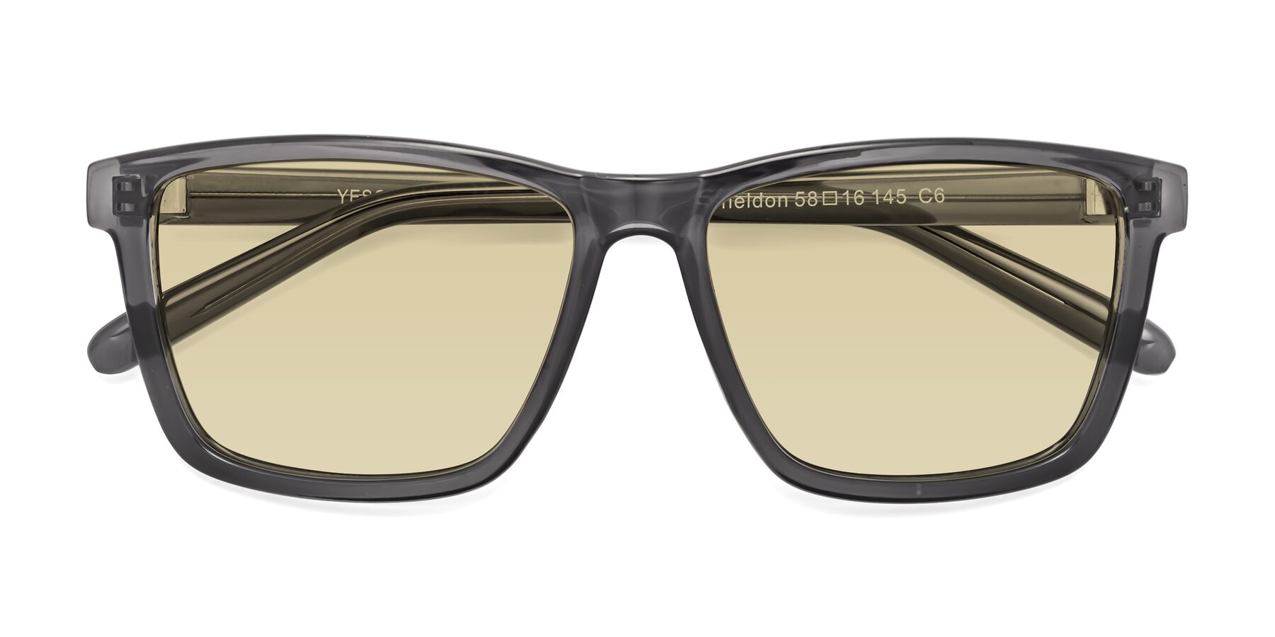 Folded Front of Sheldon in Transparent Gray with Light Champagne Tinted Lenses