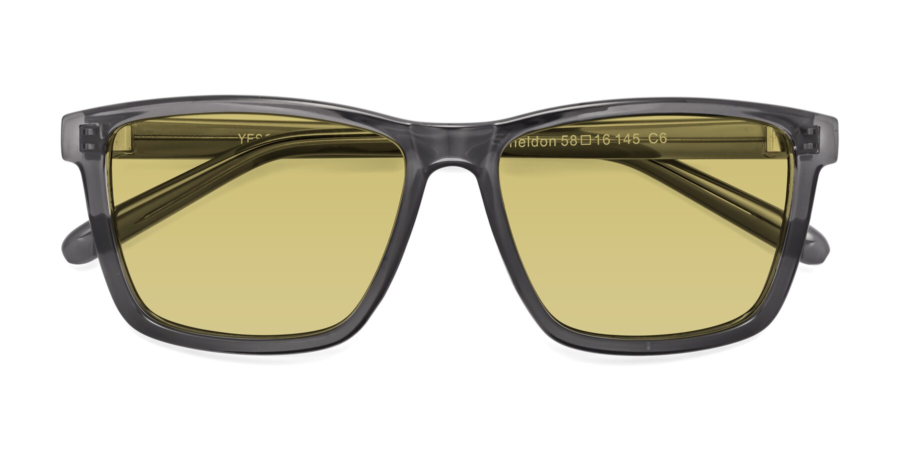 Folded Front of Sheldon in Transparent Gray with Medium Champagne Tinted Lenses