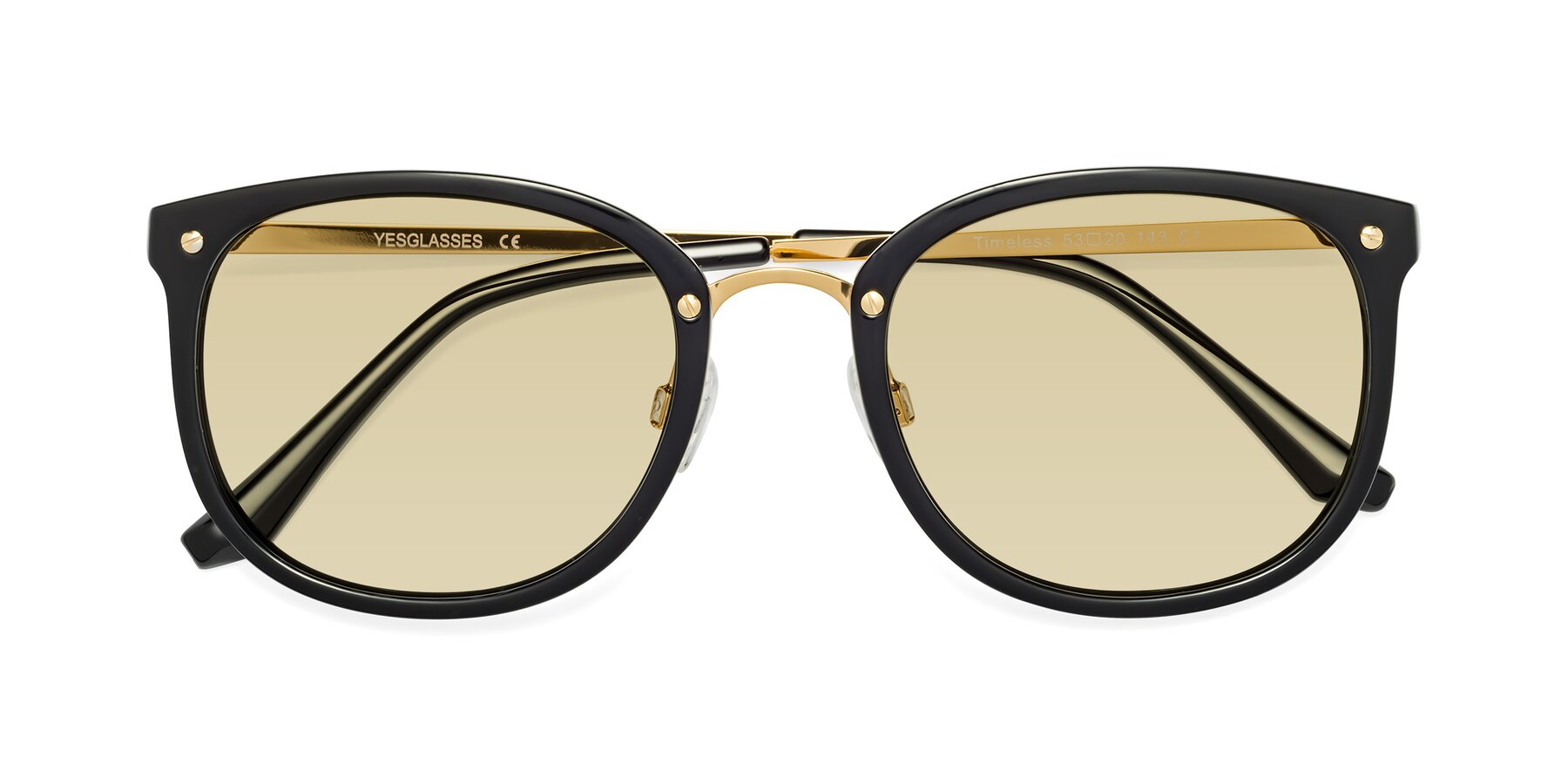 Folded Front of Timeless in Black-Gold with Light Champagne Tinted Lenses