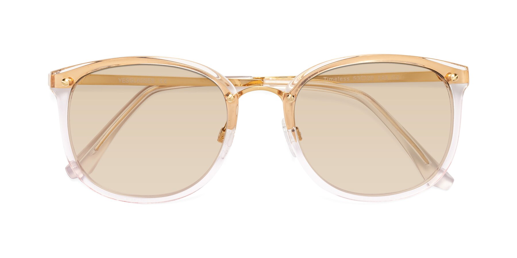 Folded Front of Timeless in Transparent Pink with Light Brown Tinted Lenses