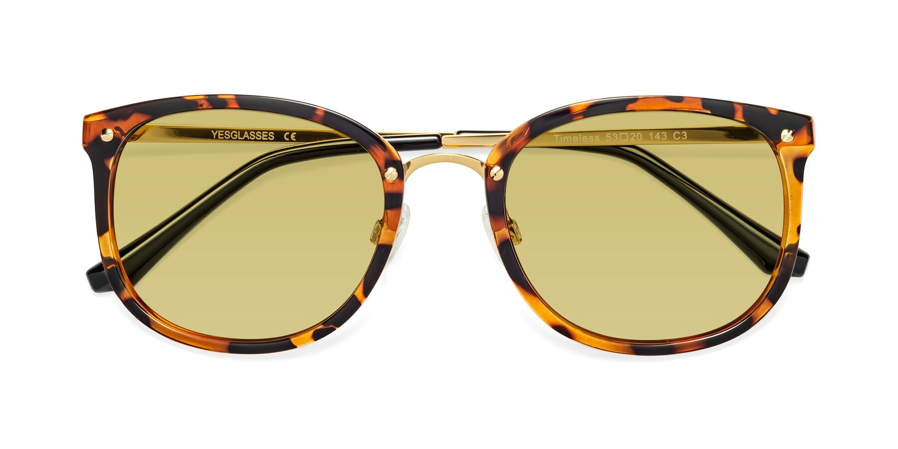 Folded Front of Timeless in Tortoise-Golden with Medium Champagne Tinted Lenses