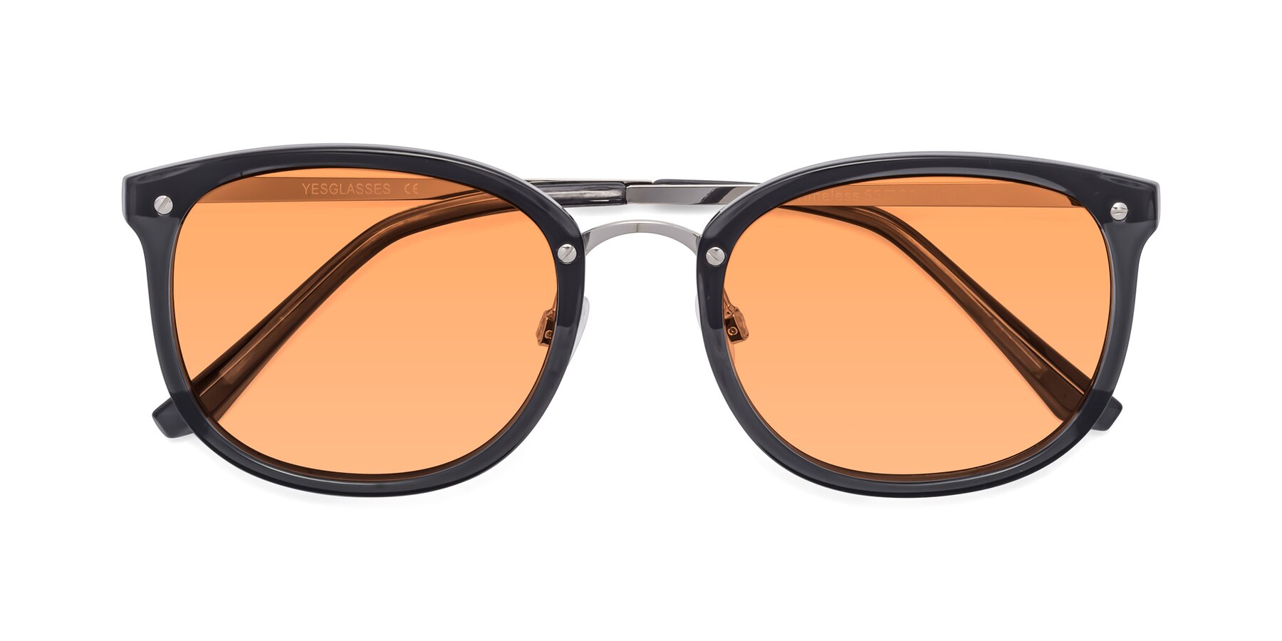 Folded Front of Timeless in Transparent Gray with Medium Orange Tinted Lenses