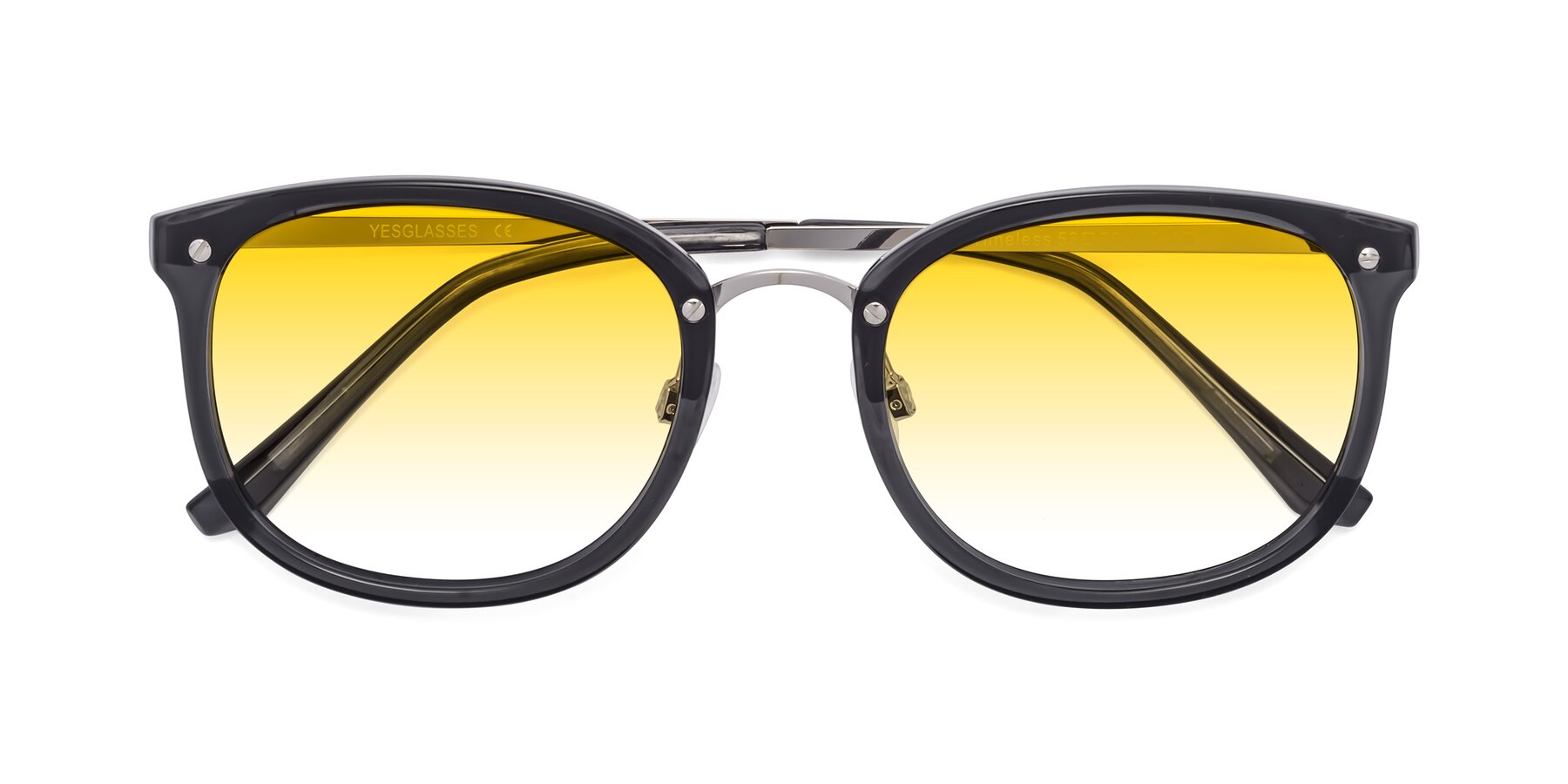 Folded Front of Timeless in Transparent Gray with Yellow Gradient Lenses