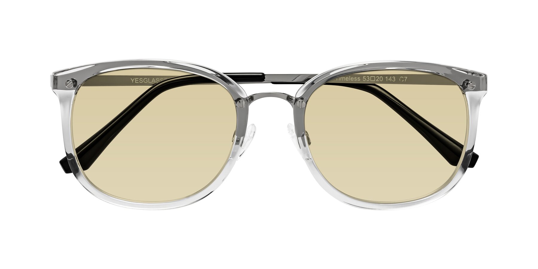 Folded Front of Timeless in Clear with Light Champagne Tinted Lenses