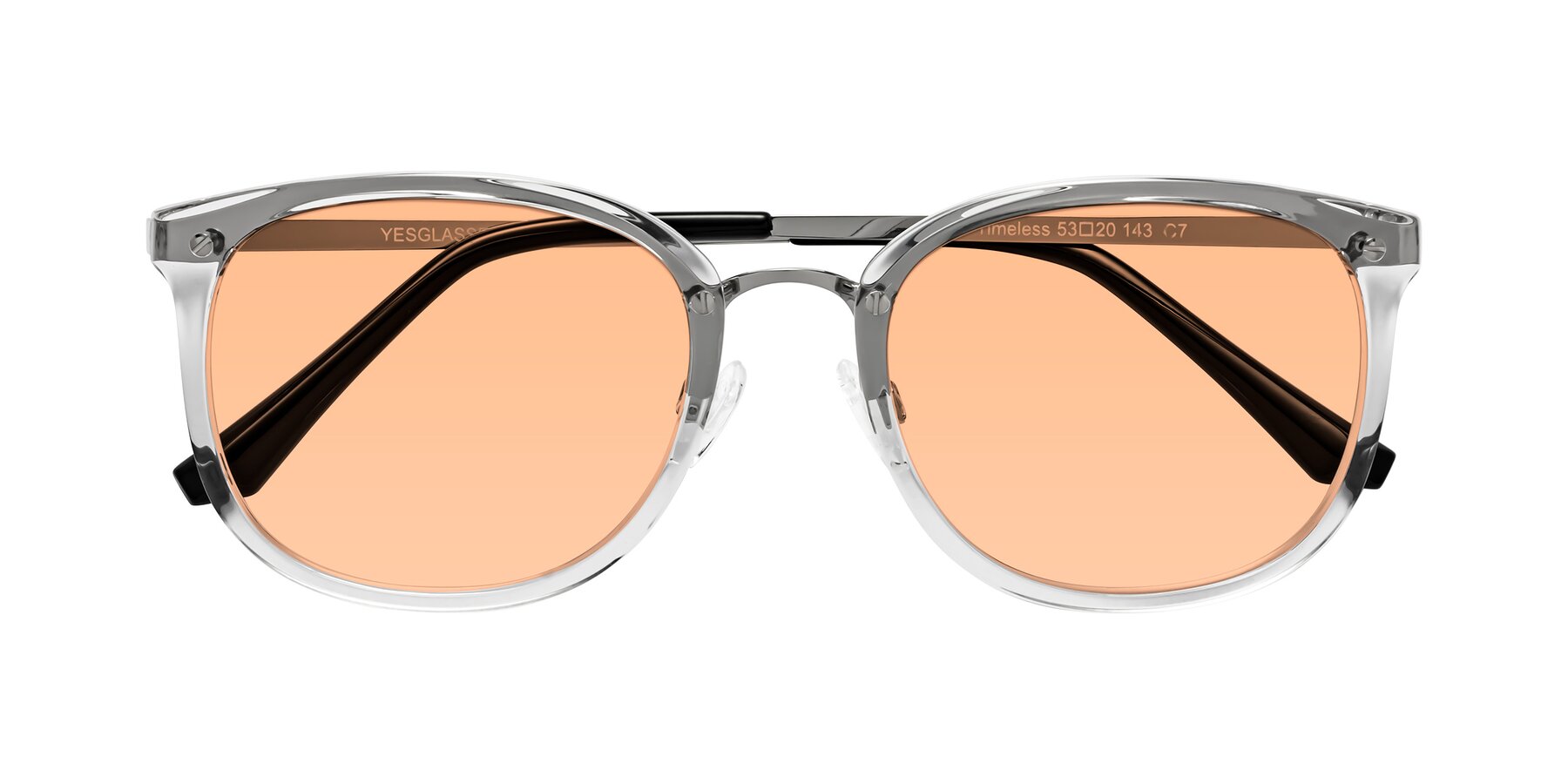 Folded Front of Timeless in Clear with Light Orange Tinted Lenses
