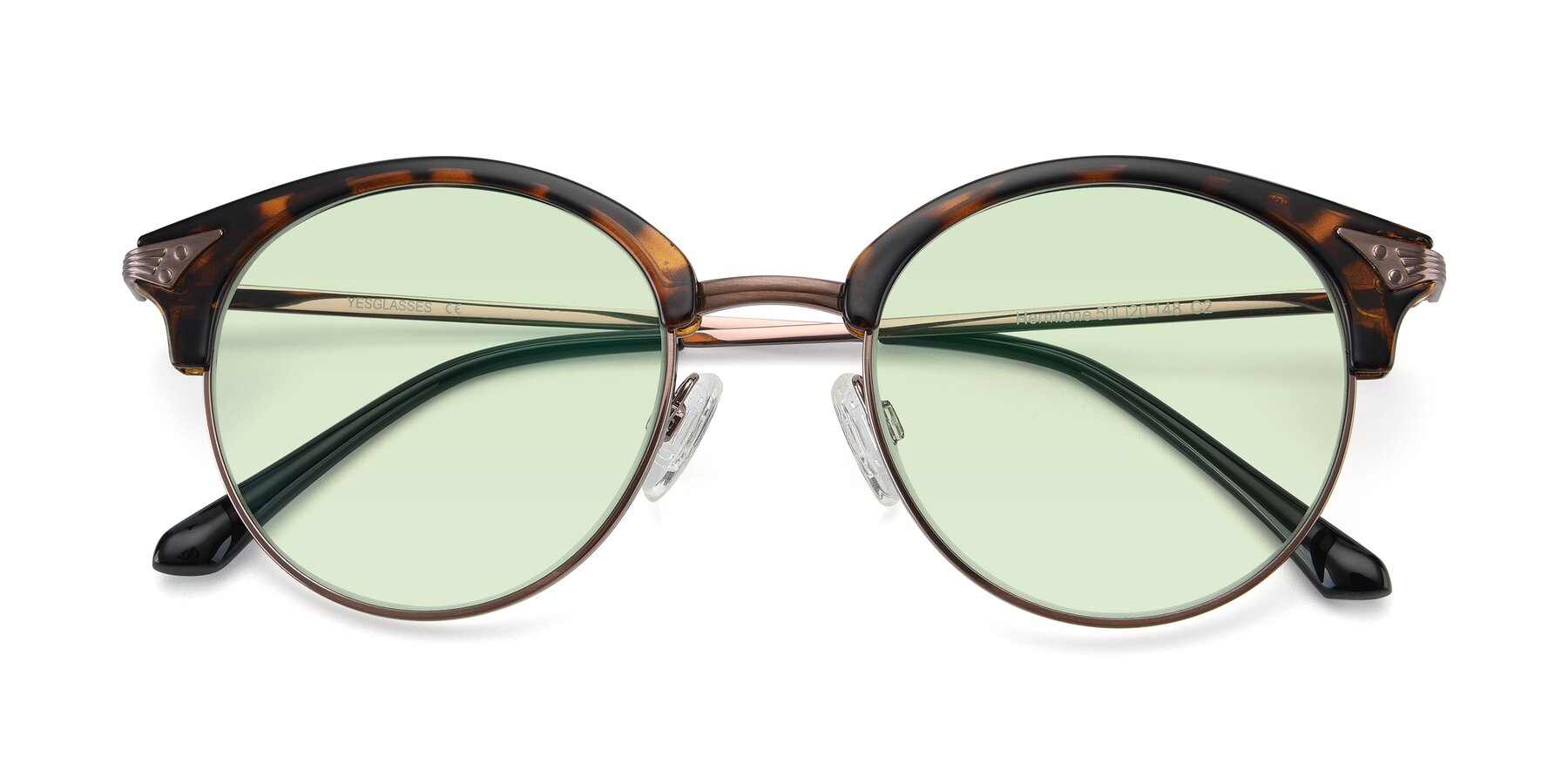 Folded Front of Hermione in Tortoise-Brown with Light Green Tinted Lenses