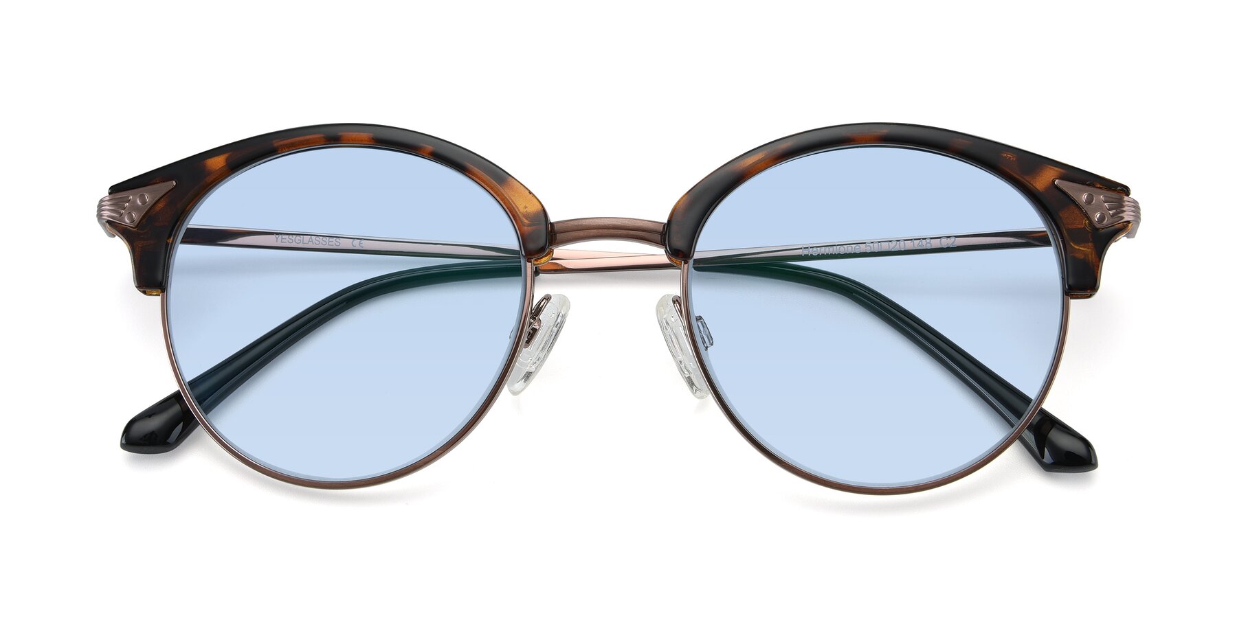 Folded Front of Hermione in Tortoise-Brown with Light Blue Tinted Lenses