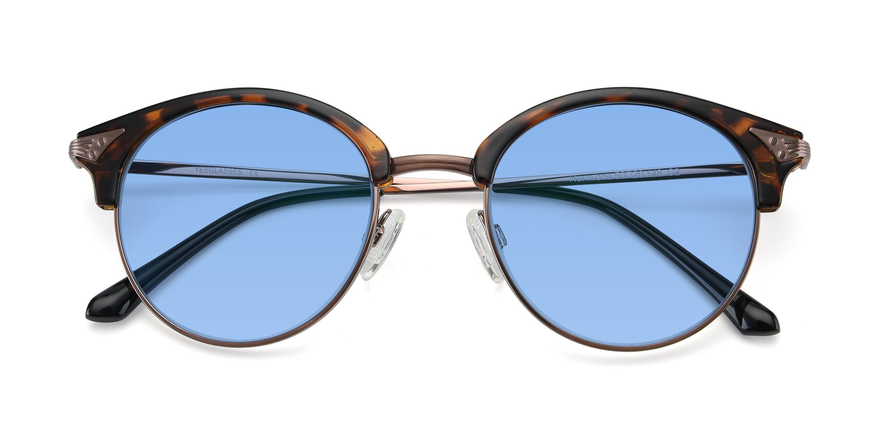 Folded Front of Hermione in Tortoise-Brown with Medium Blue Tinted Lenses