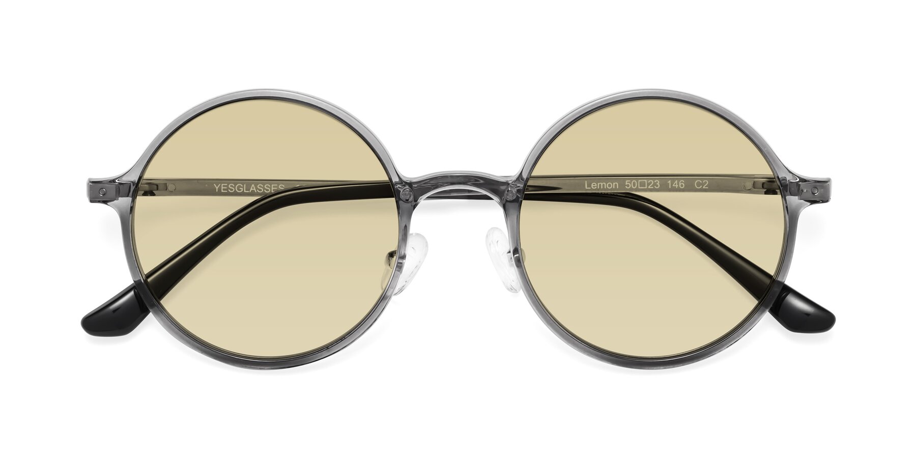 Folded Front of Lemon in Transparent Gray with Light Champagne Tinted Lenses