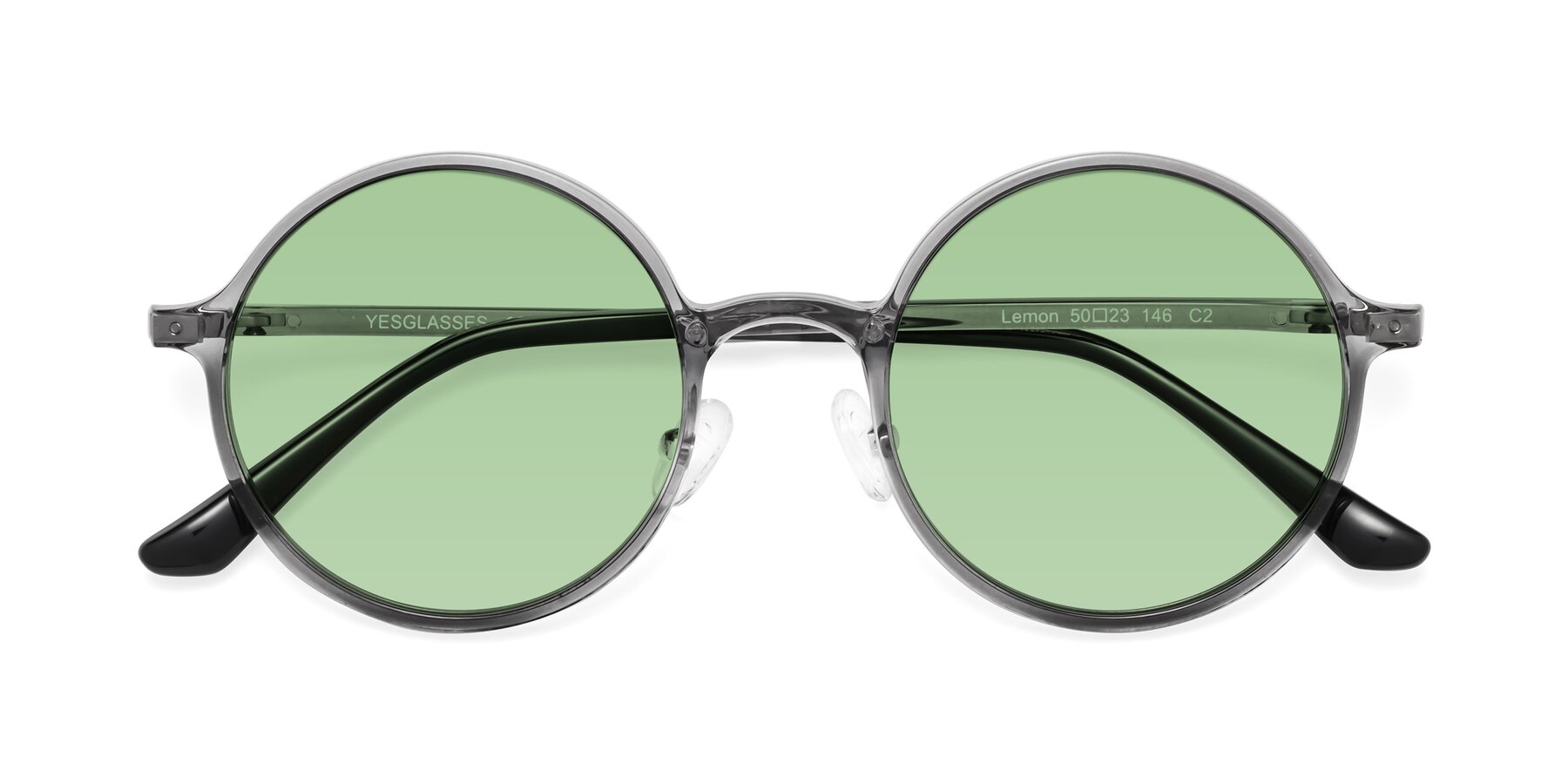 Folded Front of Lemon in Transparent Gray with Medium Green Tinted Lenses