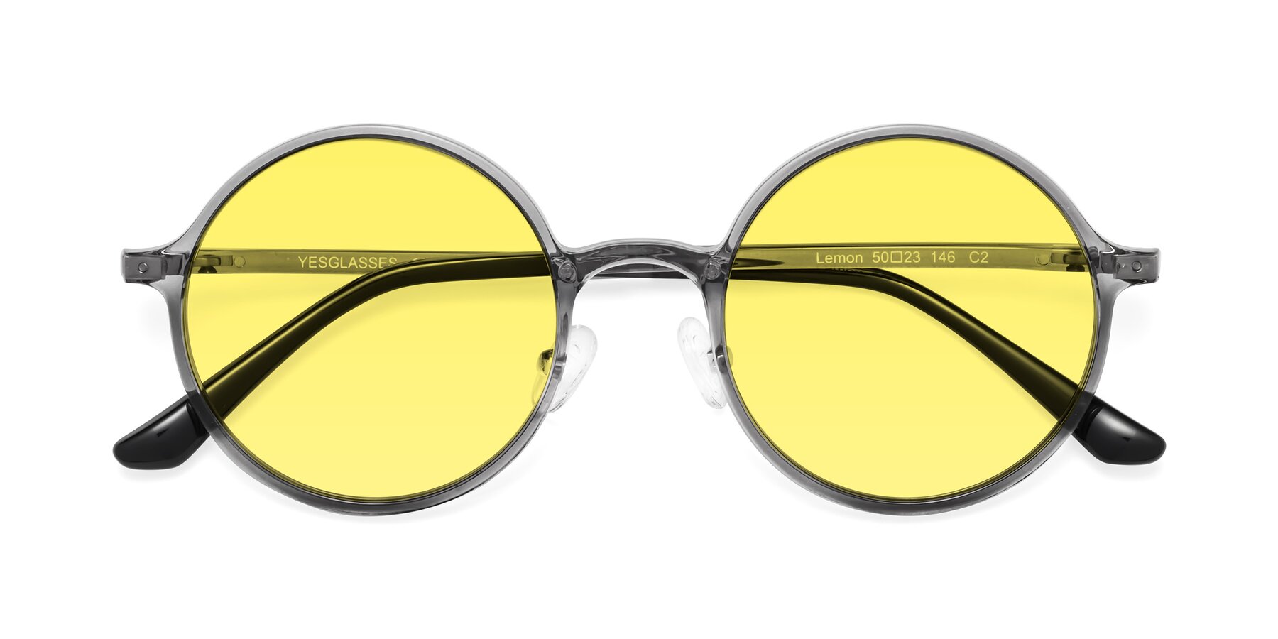 Folded Front of Lemon in Transparent Gray with Medium Yellow Tinted Lenses