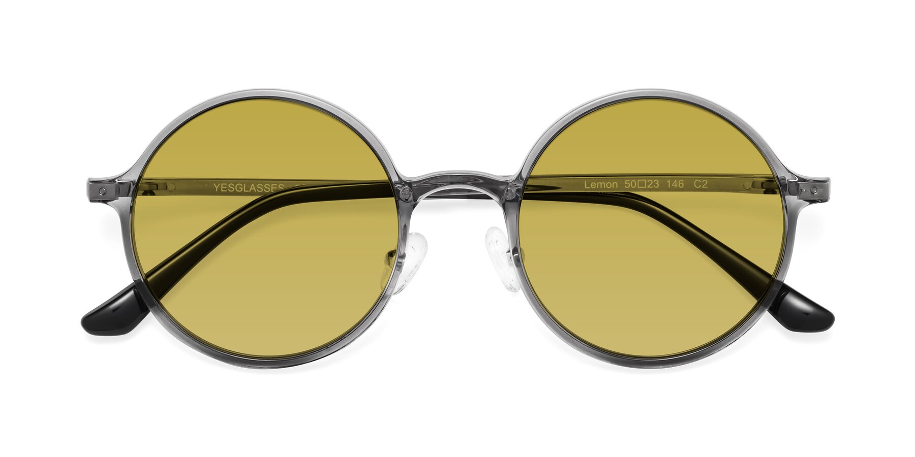 Folded Front of Lemon in Transparent Gray with Champagne Tinted Lenses