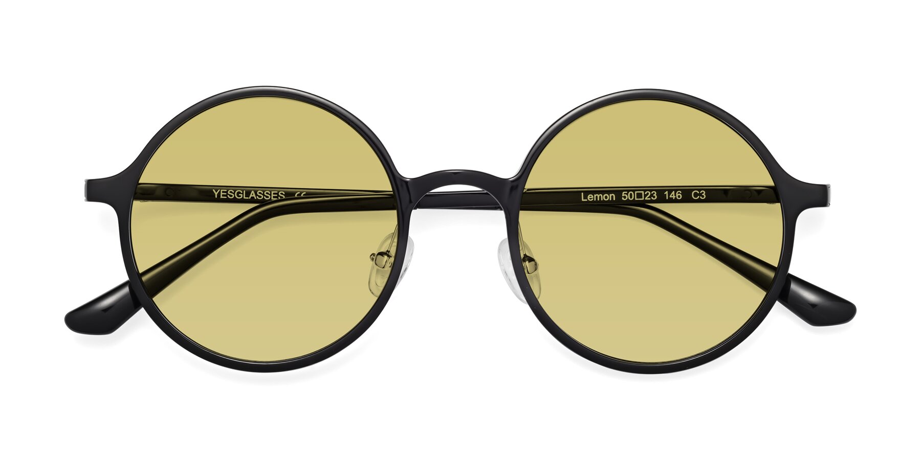 Folded Front of Lemon in Black with Medium Champagne Tinted Lenses