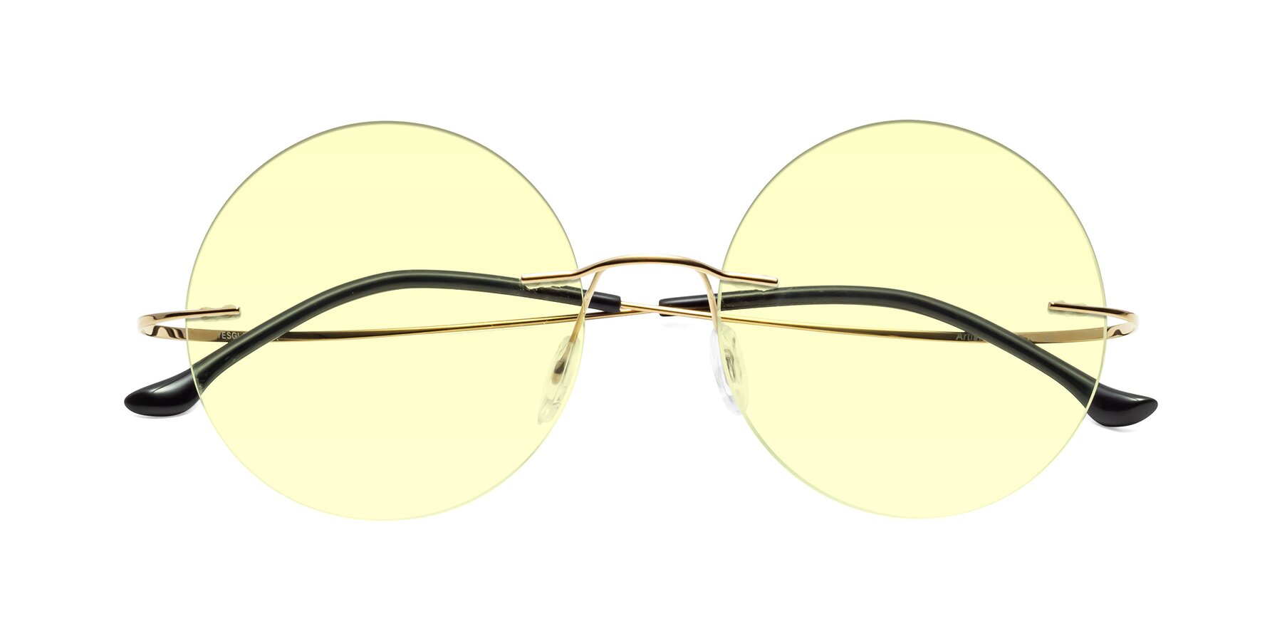 Folded Front of Artist in Gold with Light Yellow Tinted Lenses