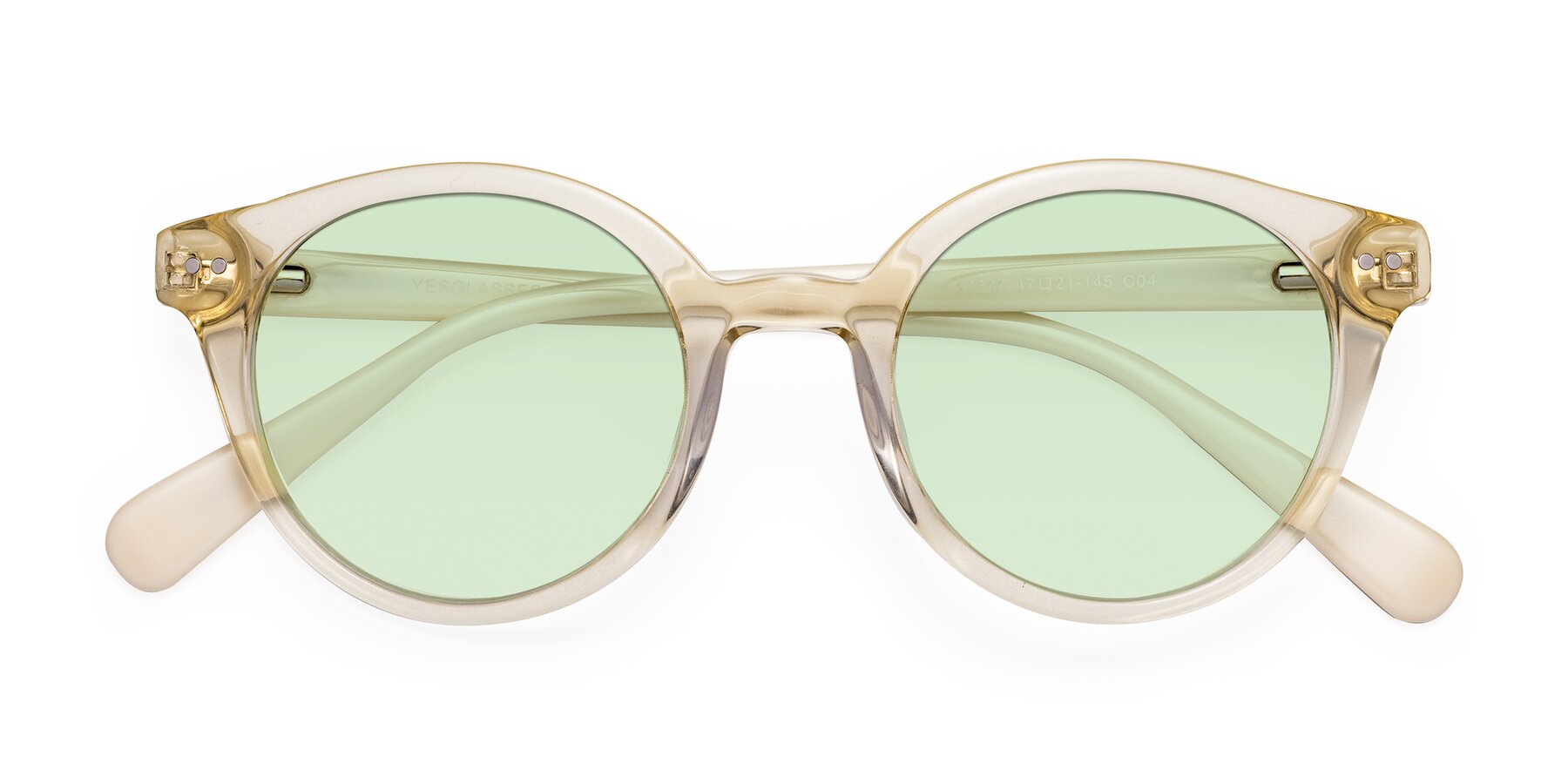 Folded Front of Bellion in Transparent Beige with Light Green Tinted Lenses