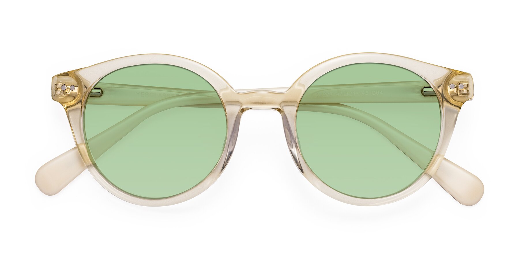 Folded Front of Bellion in Transparent Beige with Medium Green Tinted Lenses