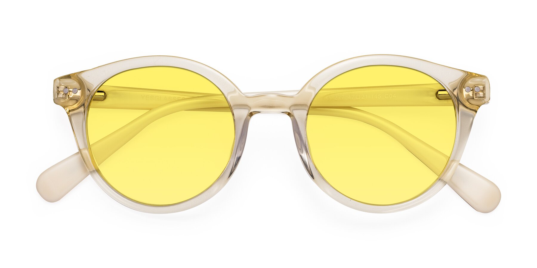 Folded Front of Bellion in Transparent Beige with Medium Yellow Tinted Lenses