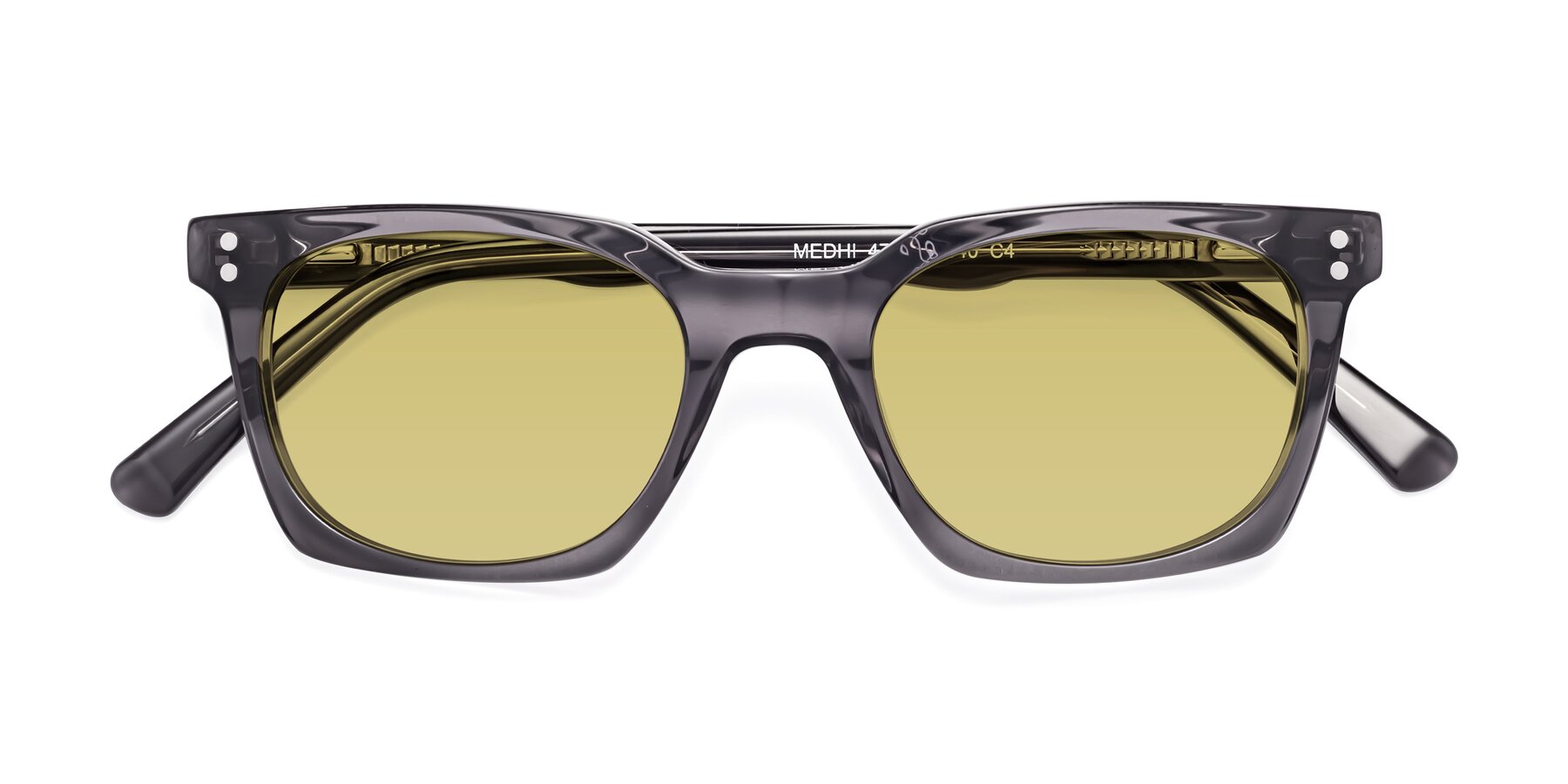 Folded Front of Medhi in Transparent Gray with Medium Champagne Tinted Lenses