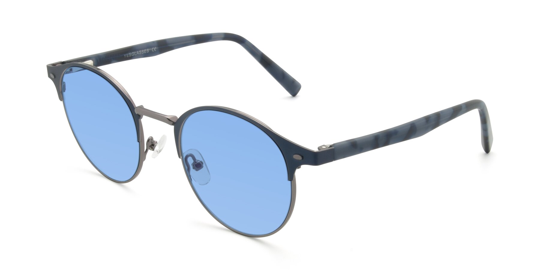 Angle of 9099 in Blue-Gunmetal with Medium Blue Tinted Lenses