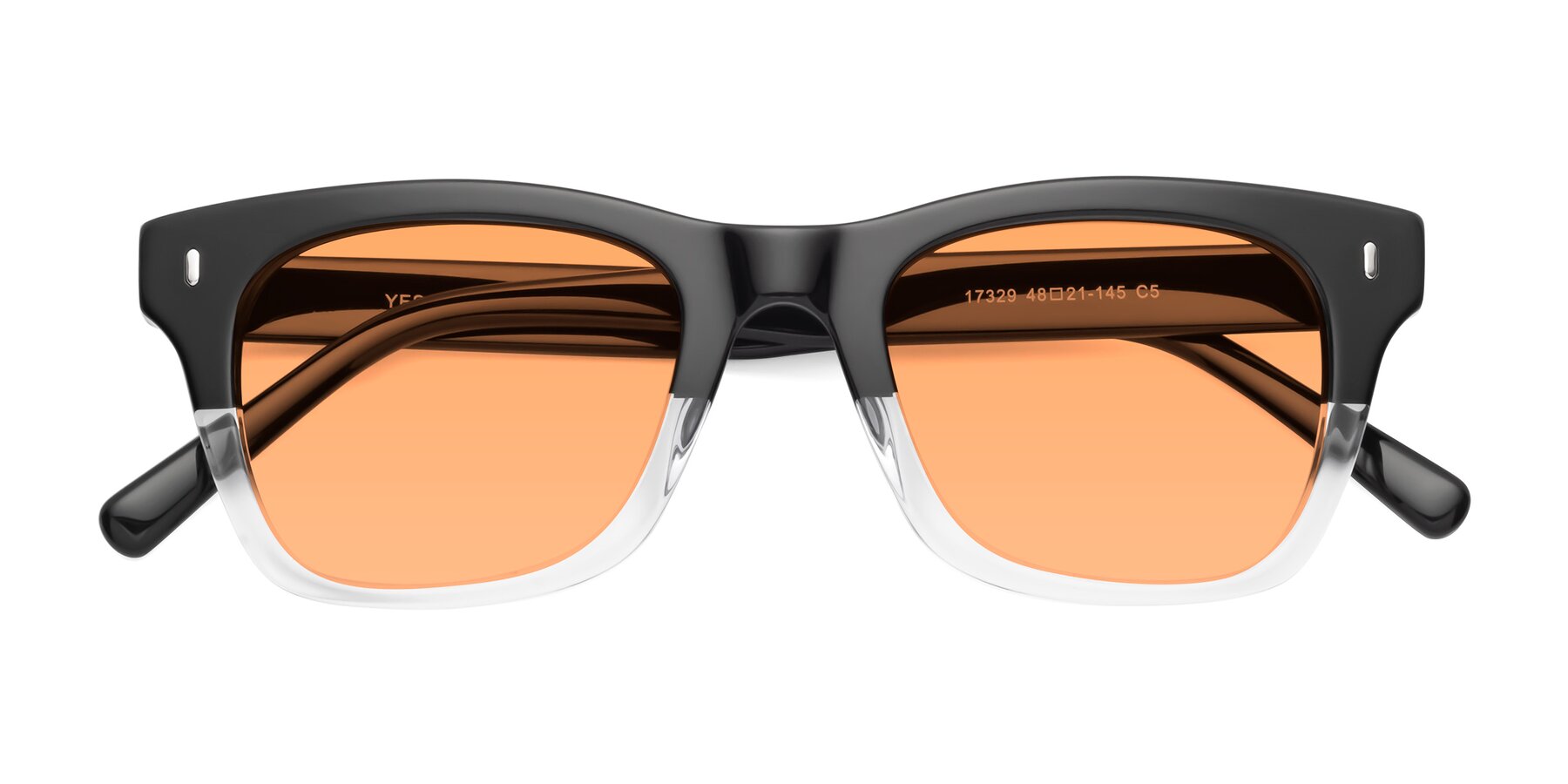 Folded Front of Ben in Black-Clear with Medium Orange Tinted Lenses