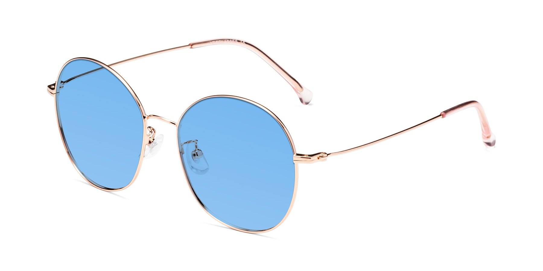 Angle of Dallas in Rose Gold with Medium Blue Tinted Lenses