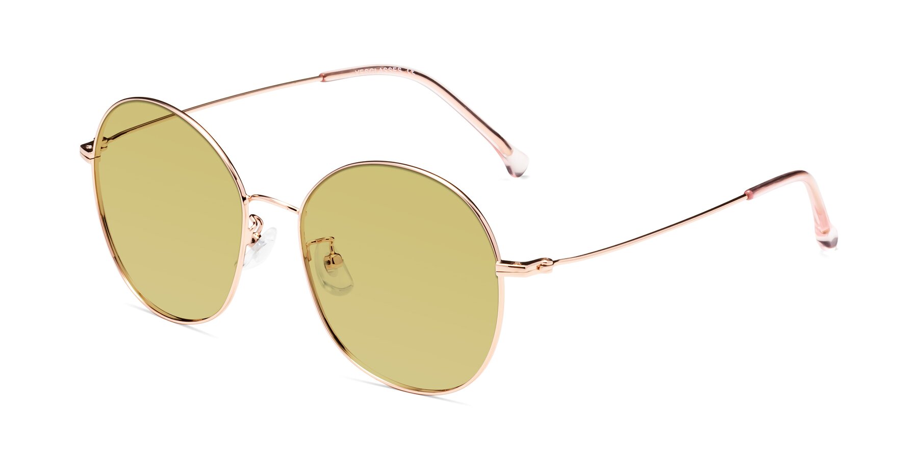 Angle of Dallas in Rose Gold with Medium Champagne Tinted Lenses