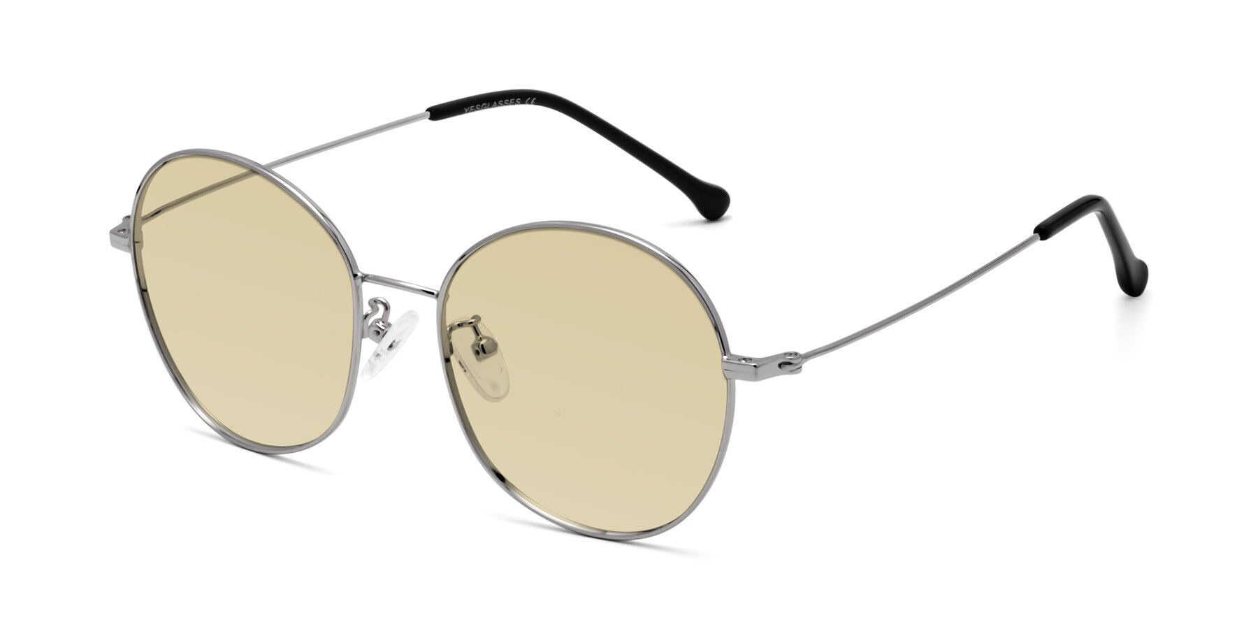 Angle of Dallas in Silver with Light Champagne Tinted Lenses