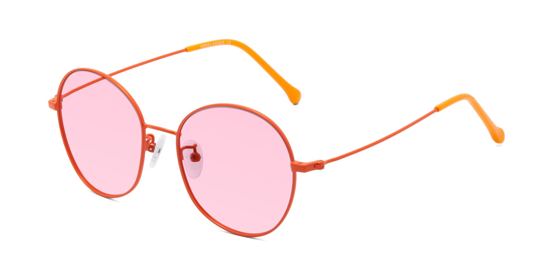 Angle of Dallas in Orange with Light Pink Tinted Lenses