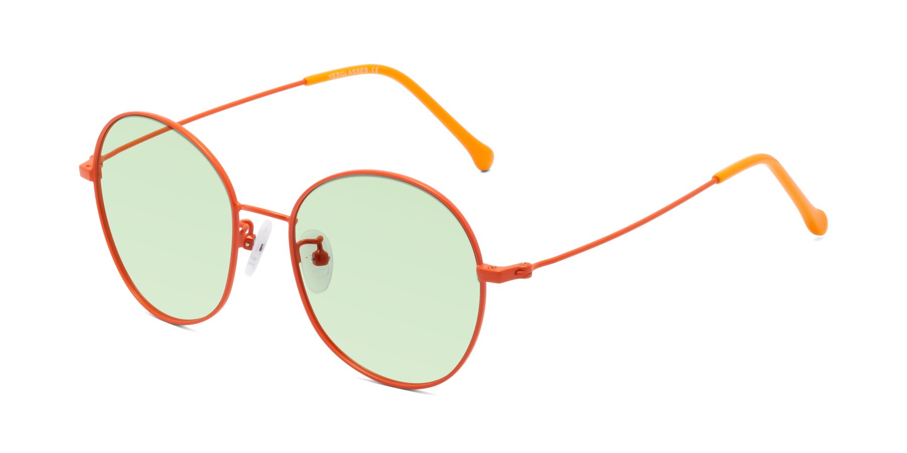 Angle of Dallas in Orange with Light Green Tinted Lenses