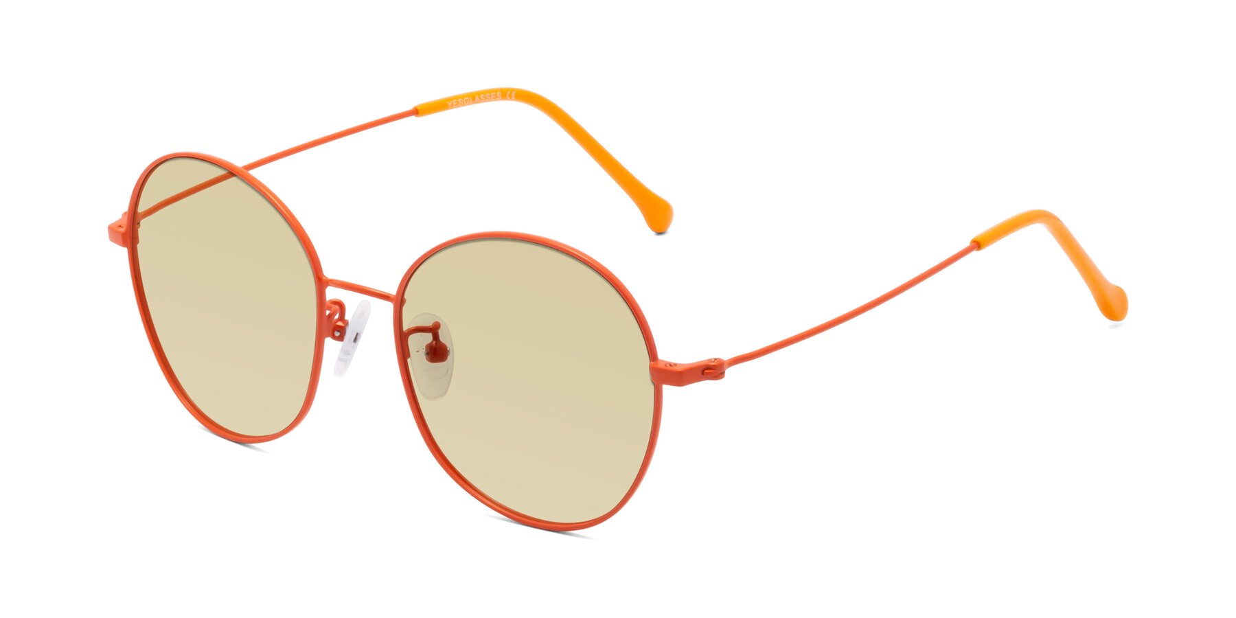 Angle of Dallas in Orange with Light Champagne Tinted Lenses