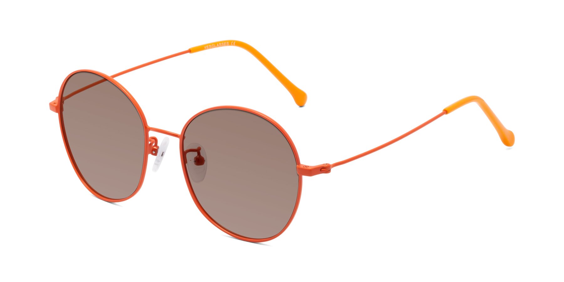 Angle of Dallas in Orange with Medium Brown Tinted Lenses