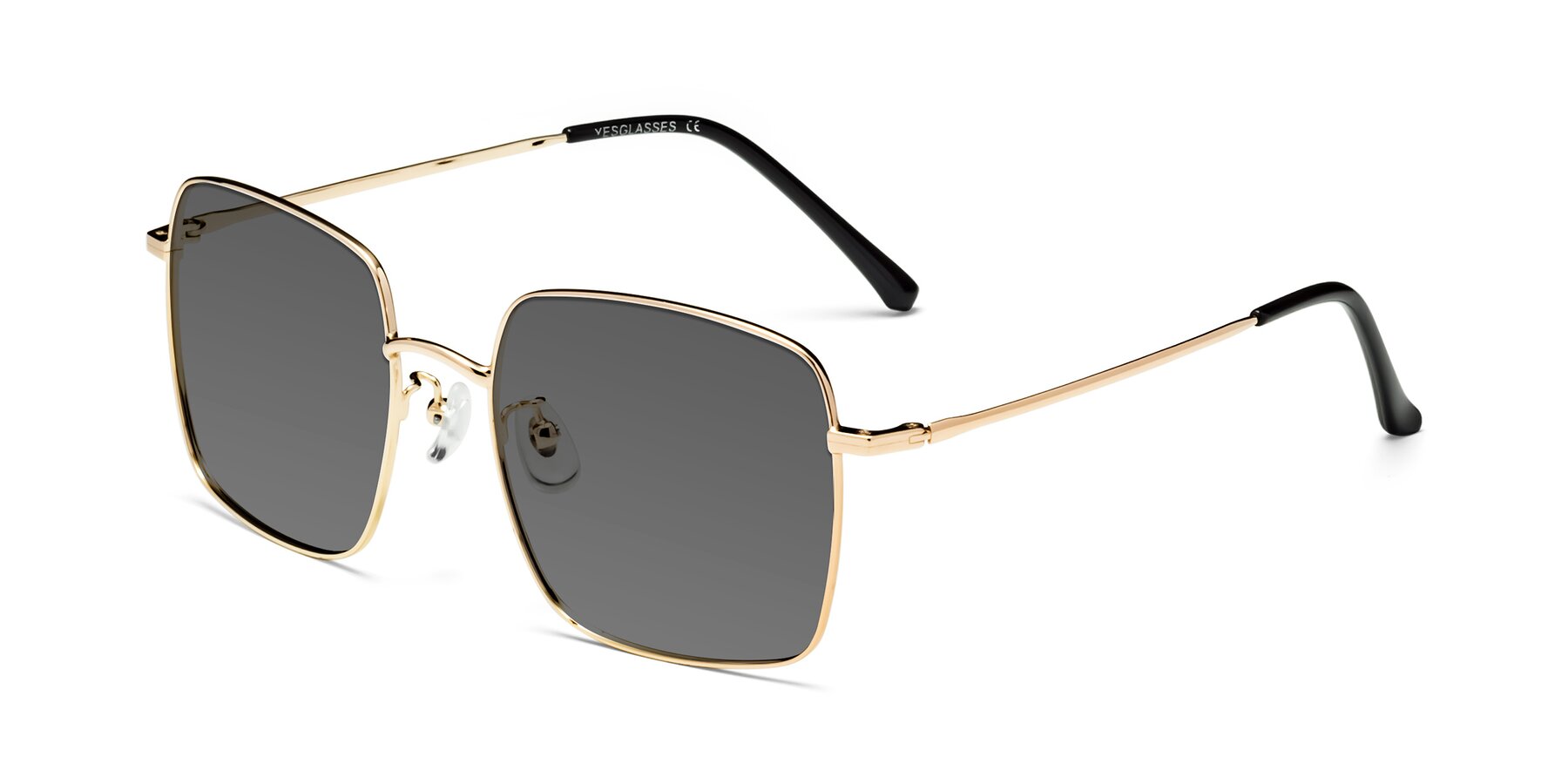 Angle of Billie in Gold with Medium Gray Tinted Lenses
