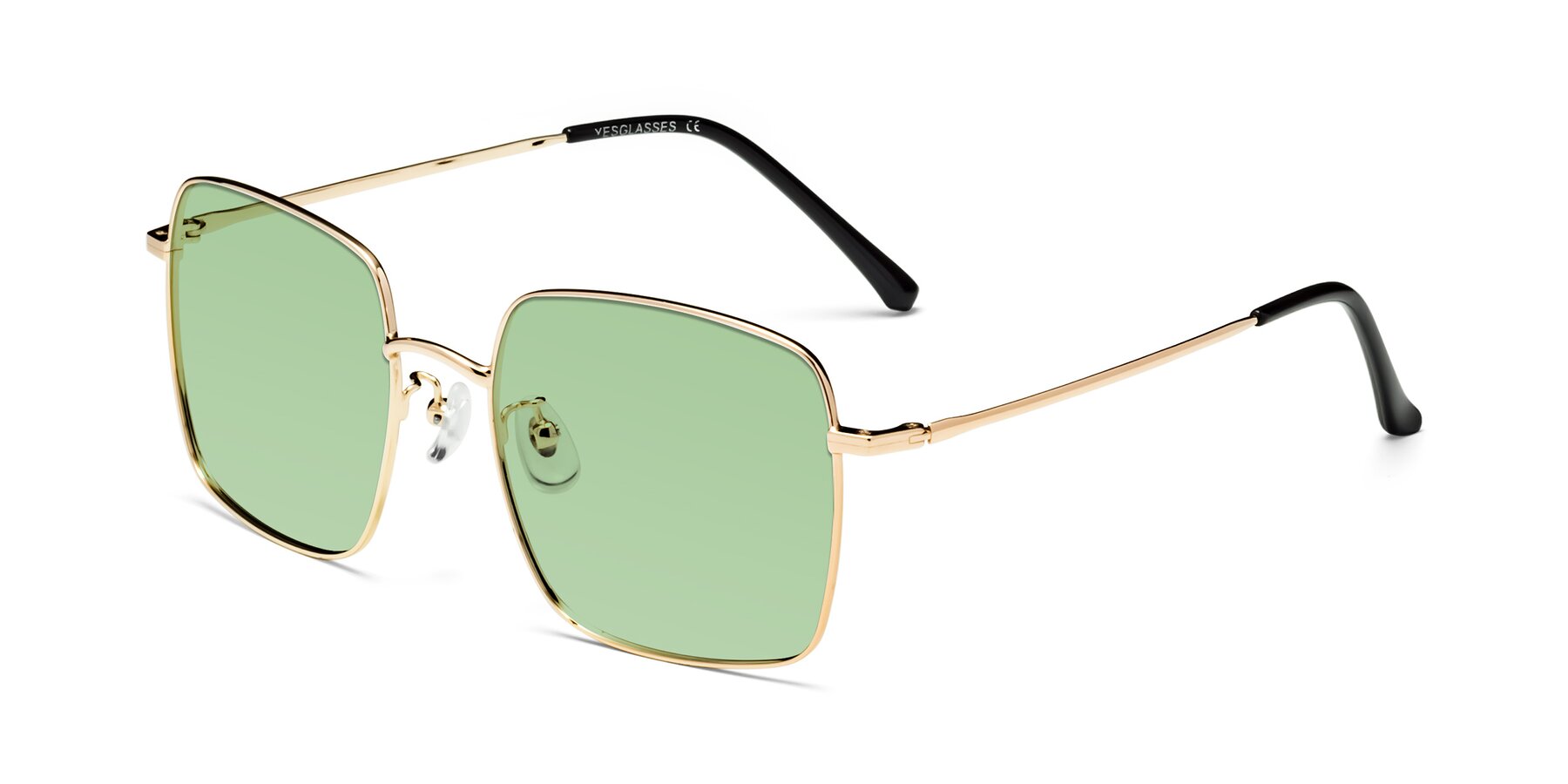 Angle of Billie in Gold with Medium Green Tinted Lenses
