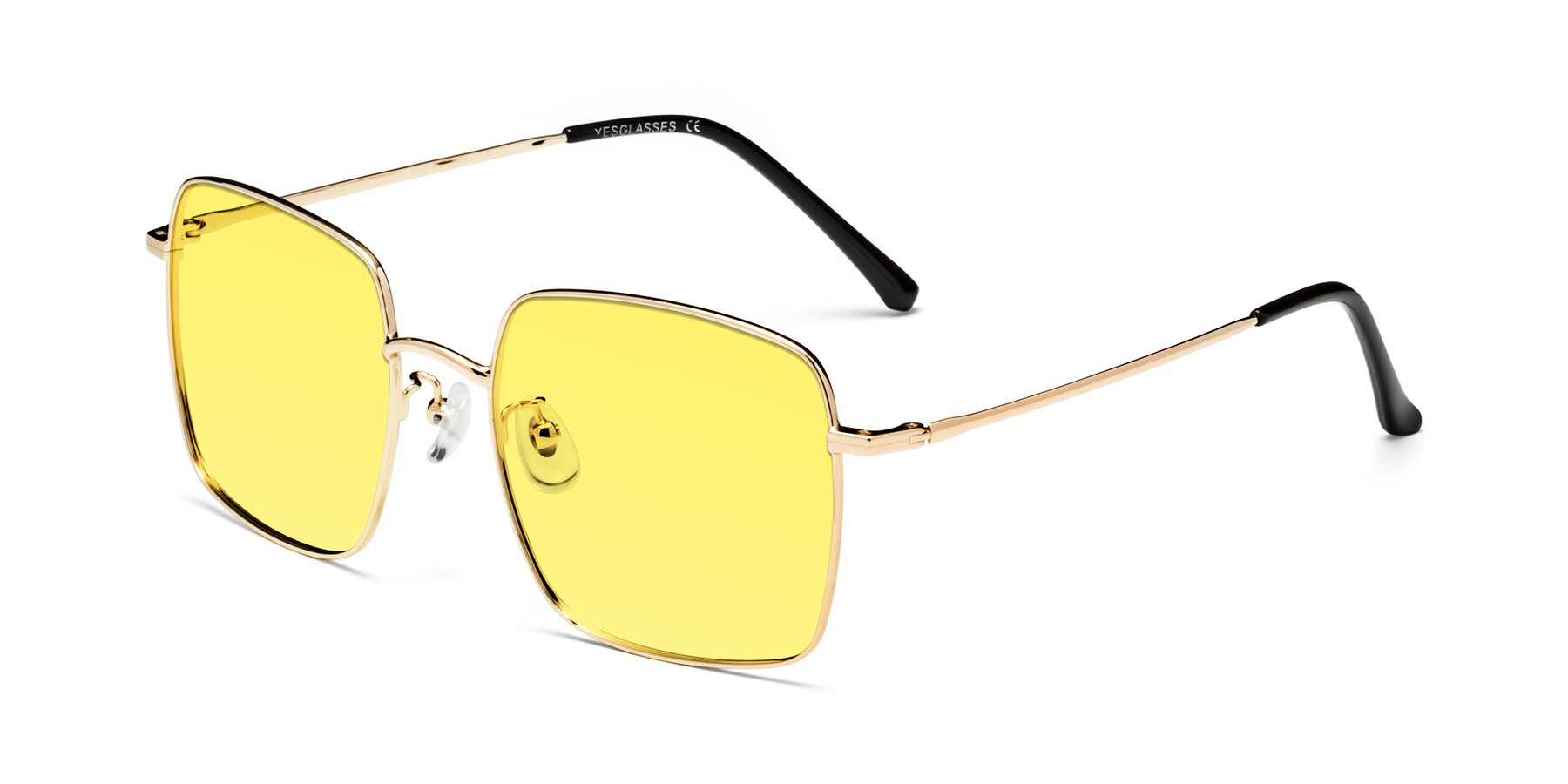 Angle of Billie in Gold with Medium Yellow Tinted Lenses