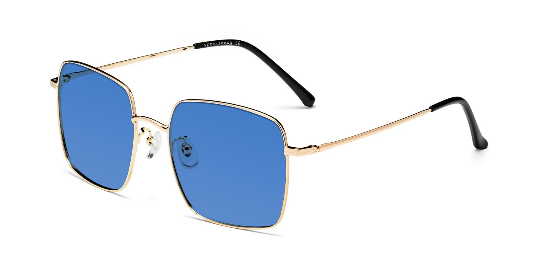 Angle of Billie in Gold with Blue Tinted Lenses