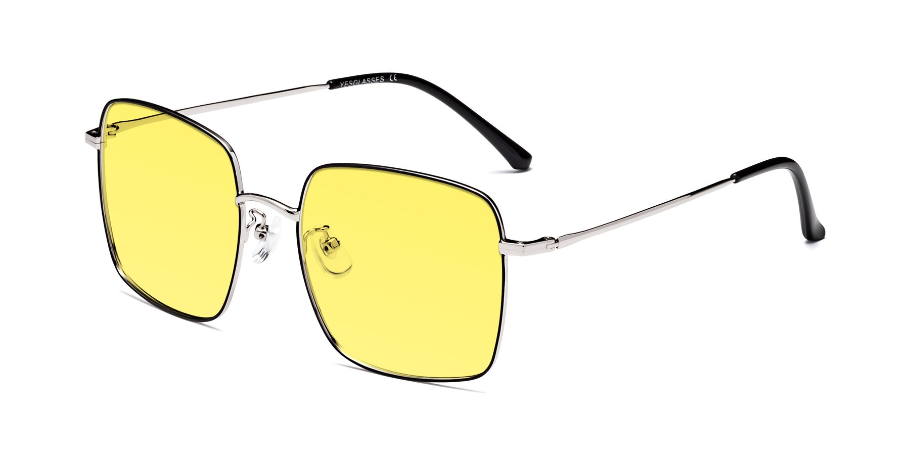 Angle of Billie in Black-Silver with Medium Yellow Tinted Lenses